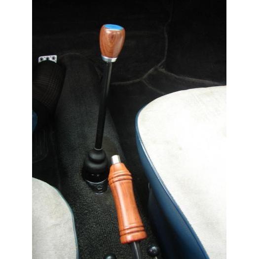 Rosewood shift knob with `FLAT 4 GT` emblem